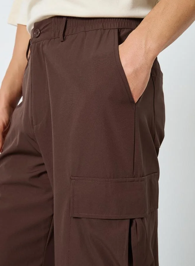 Styli  Men Oversized Front Pleat Cargo Pants for Men | Best Price UAE